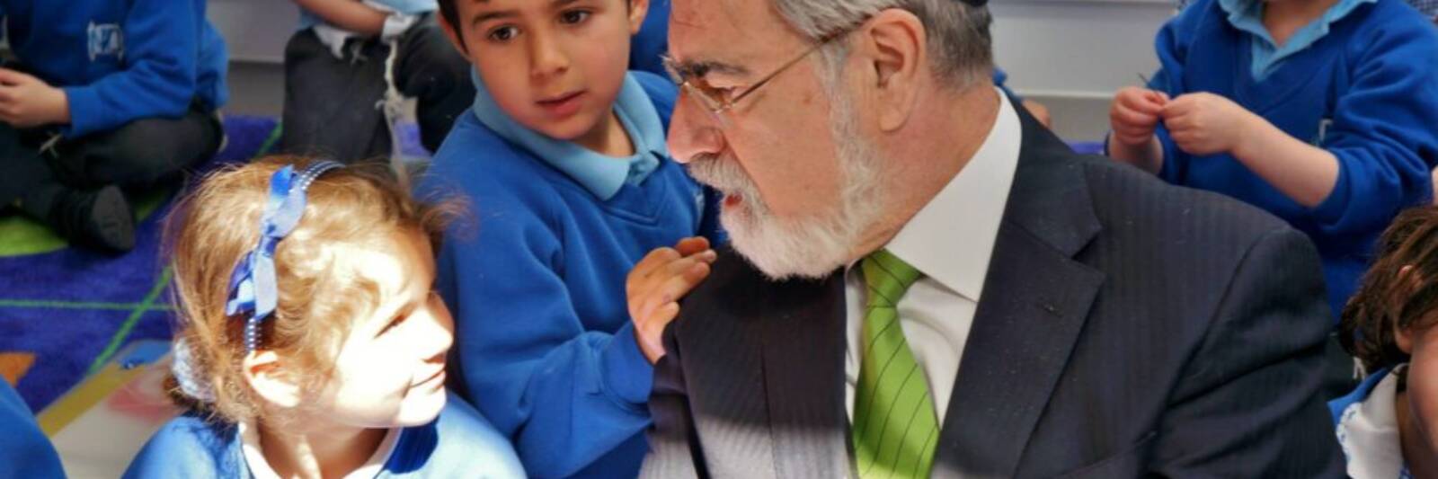 rabbi jonathan sacks morasha schoolchildren schoolkids mat closeup questions boy girl primary teacher jewish young