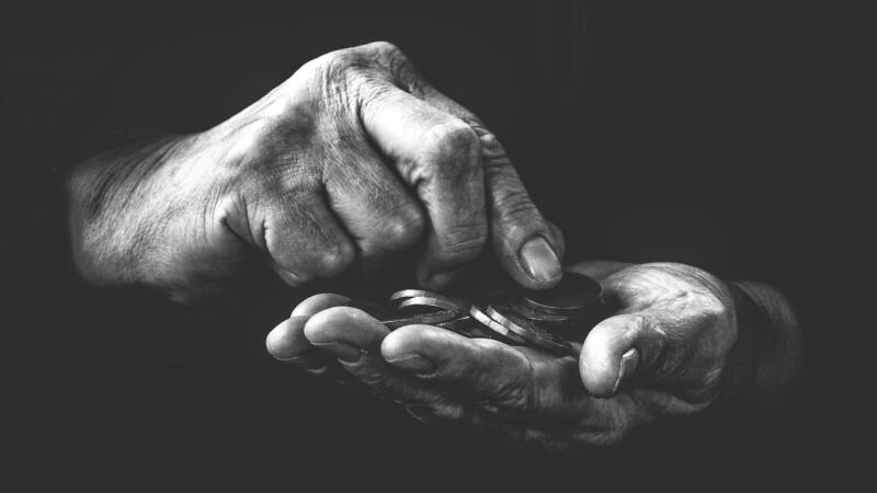 poverty hands tzedakah money giving receiving needing poor