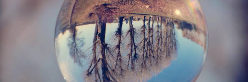 glass sphere reflection world upside down snow globe