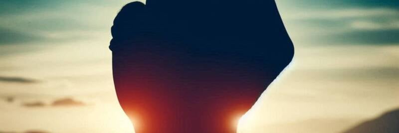 zealot anger resistance fist raised in silhouette protest refusal power fight elijah 1536x1536 1