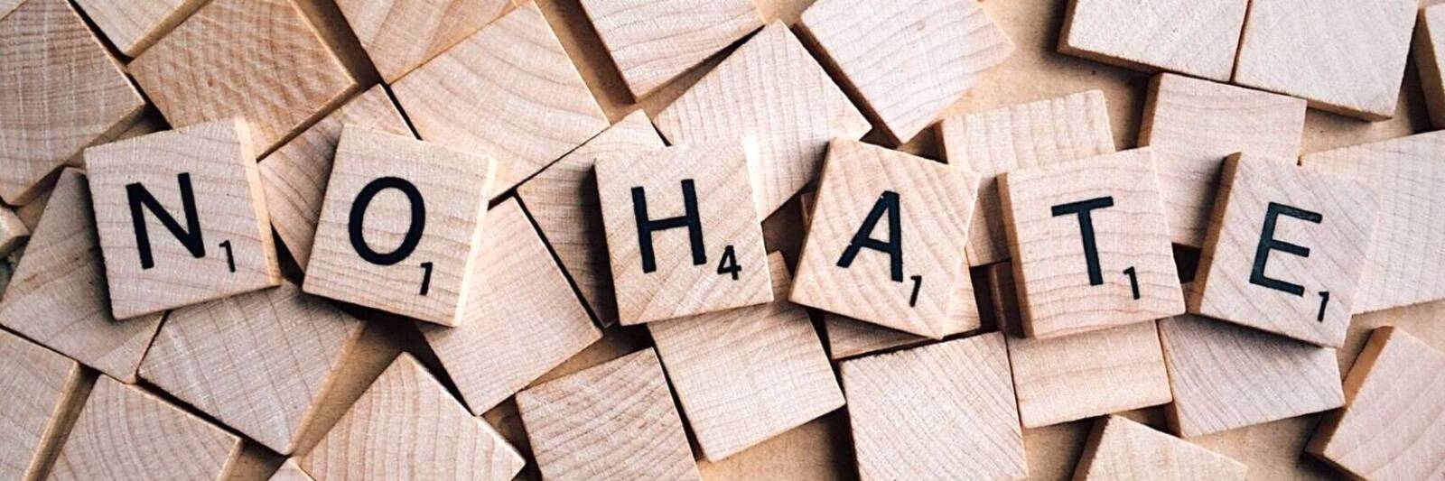 no hate hatred letters scrabble enemies peace wood 1536x1024 1