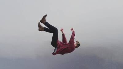 man falling help save catch danger lost floundering guy