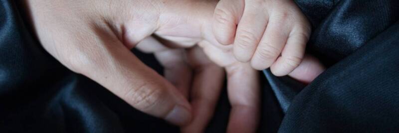 touch mother and baby holding hands care love parent newborn child family