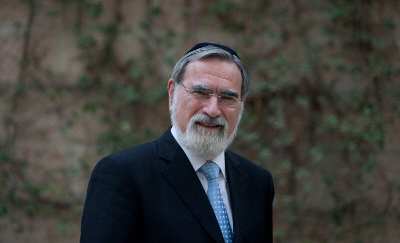 rabbi sacks nature behind him leaves branches portrait